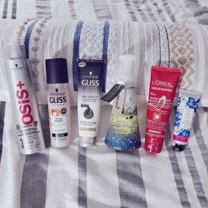 Hair Care Product Set with Red, Black, and White Packaging